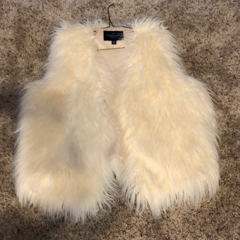 Cream colored fur vest